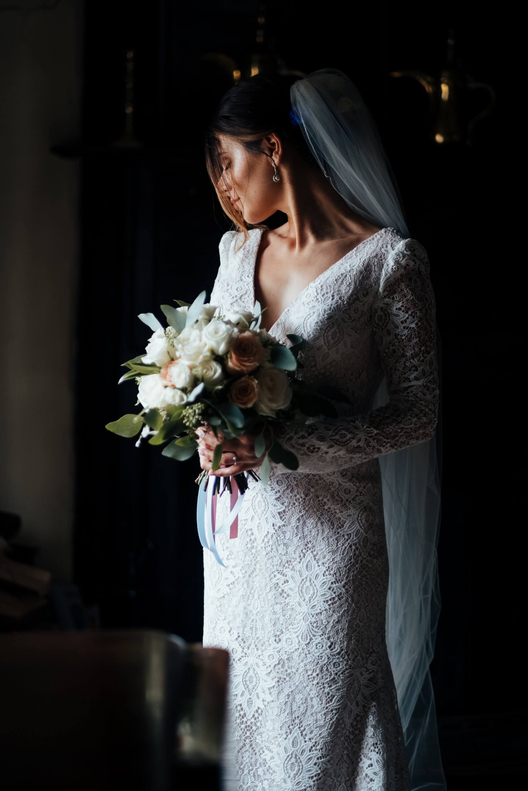 Bridal portrait with window light lighting the brides face and side | Kent Wedding Photographer