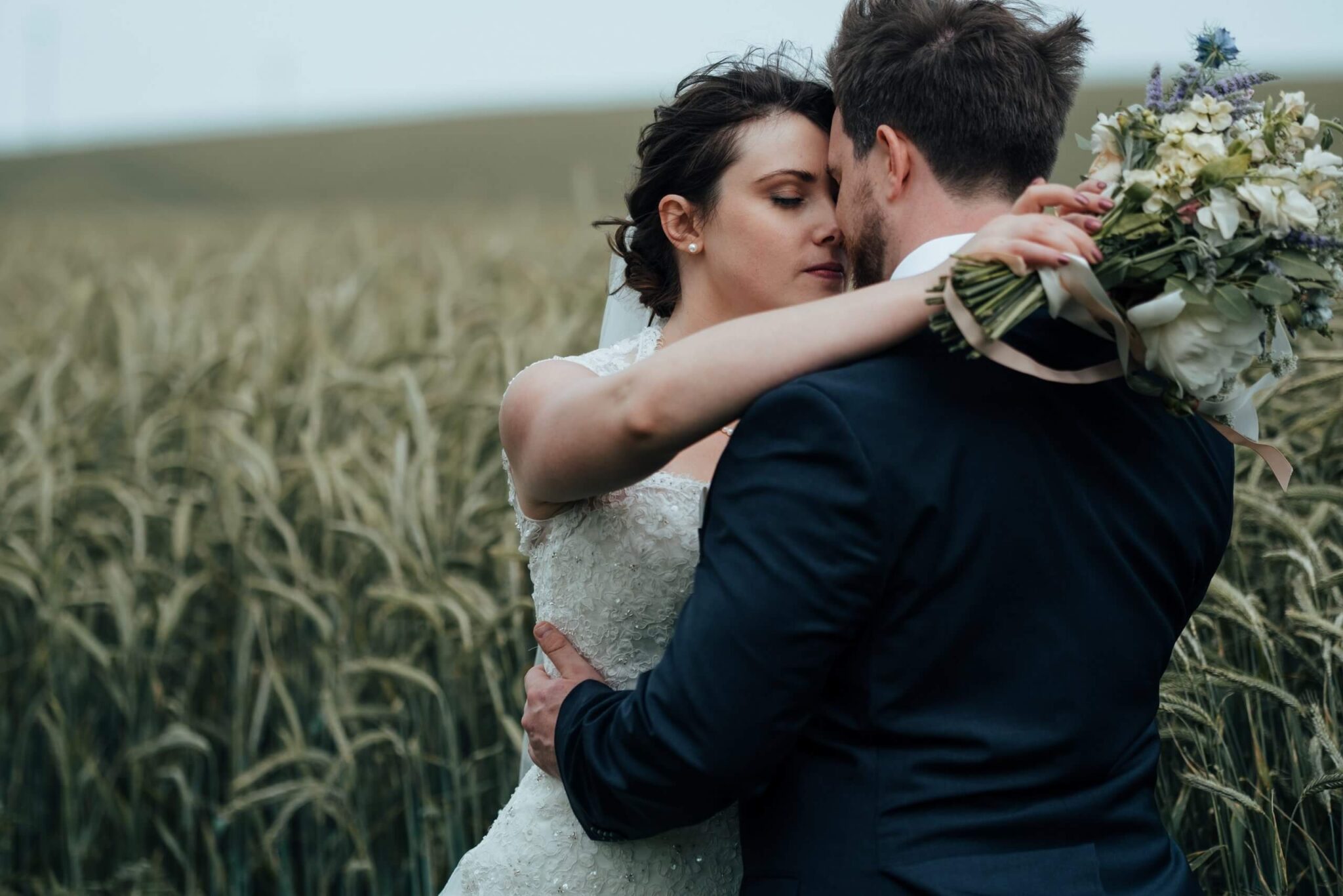 Bride and Groom embracing